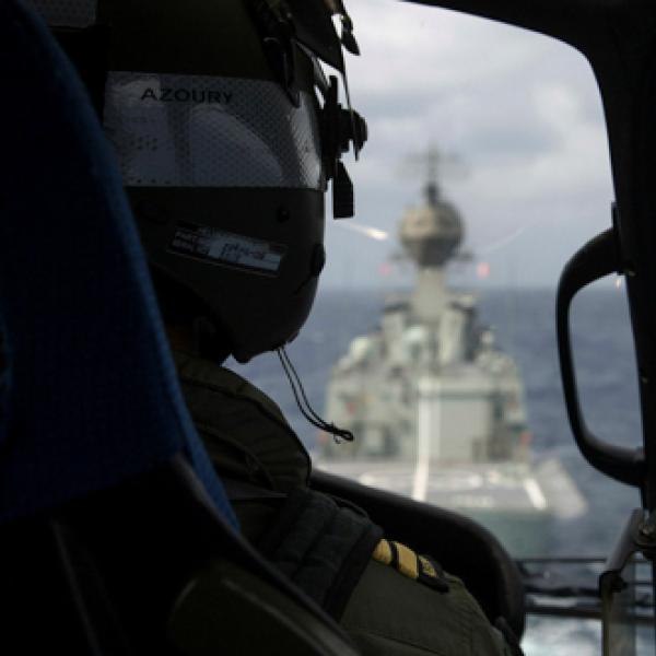 Helicopter on approach to ship - pilot view