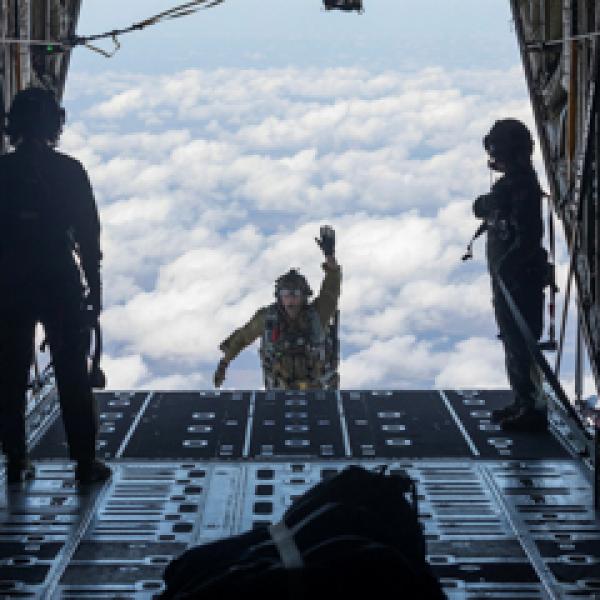 Person jumping from aircraft in flight